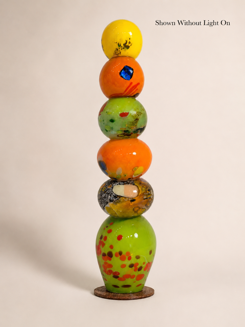 23 inch handblown glass light tower shown without light on to show the original glass colors