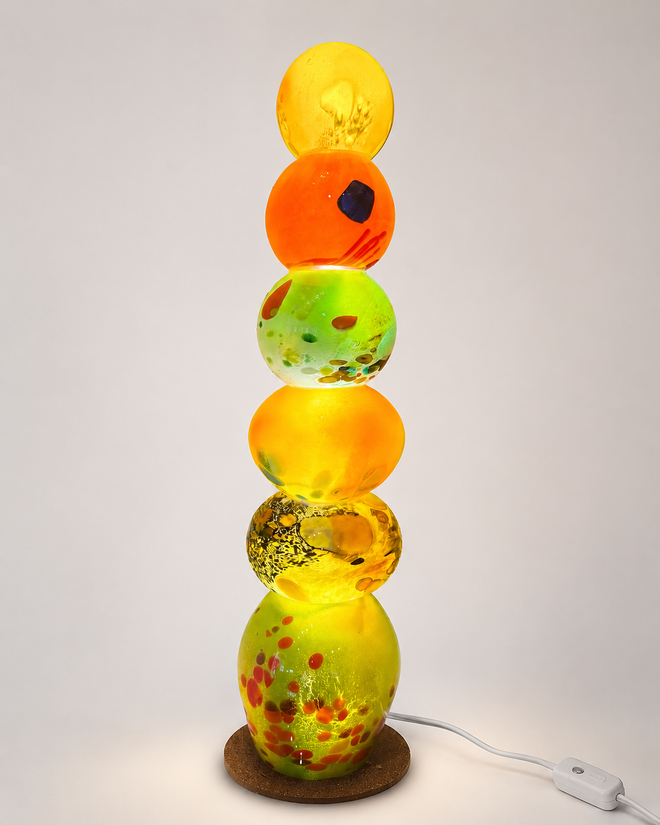 23 inch handblown glass light tower with yellow orange and green illuminated glass