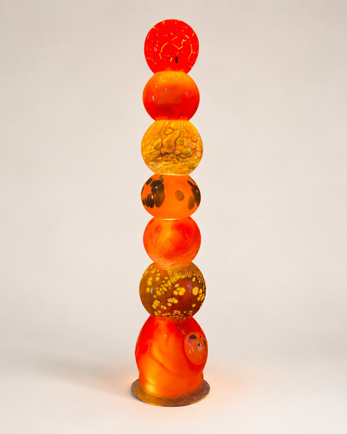25.5 inch handblown glass light tower with red orange and amber illuminated glass