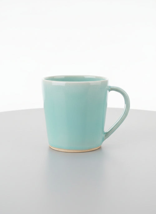 Handmade Aqua Ceramic Cup by Corinne De Haas
