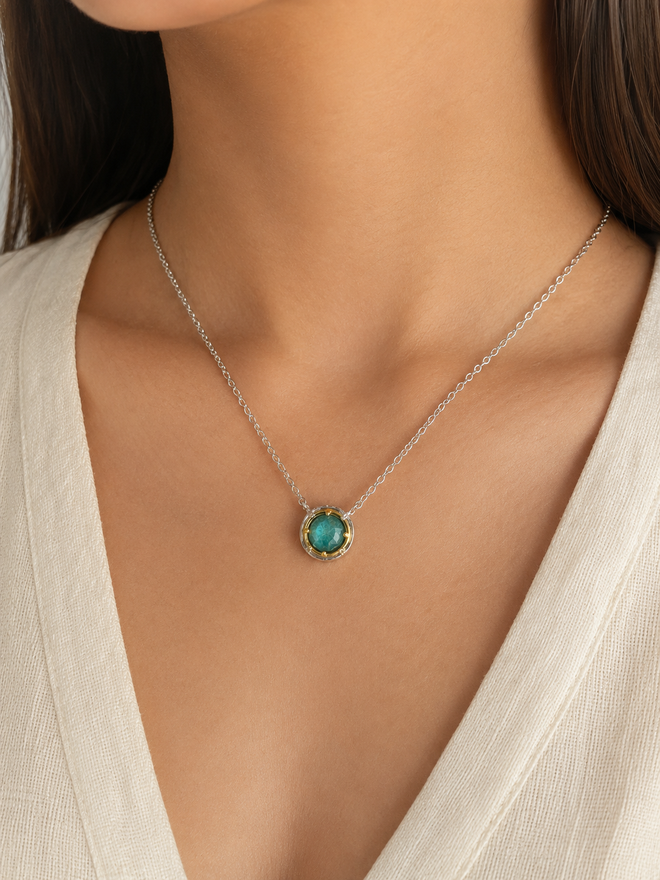 Elegant 8mm Chrysocolla pendant necklace in sterling silver with 18k gold vermeil accents. Artisan gemstone jewelry from Raku Gallery Arizona.