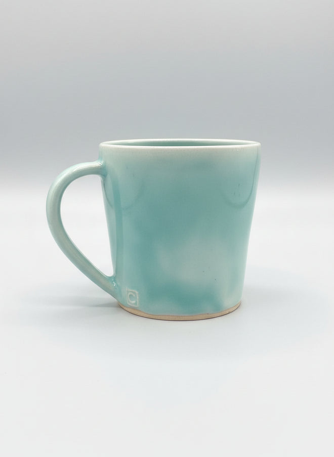 Handmade Aqua Ceramic Cup by Corinne De Haas