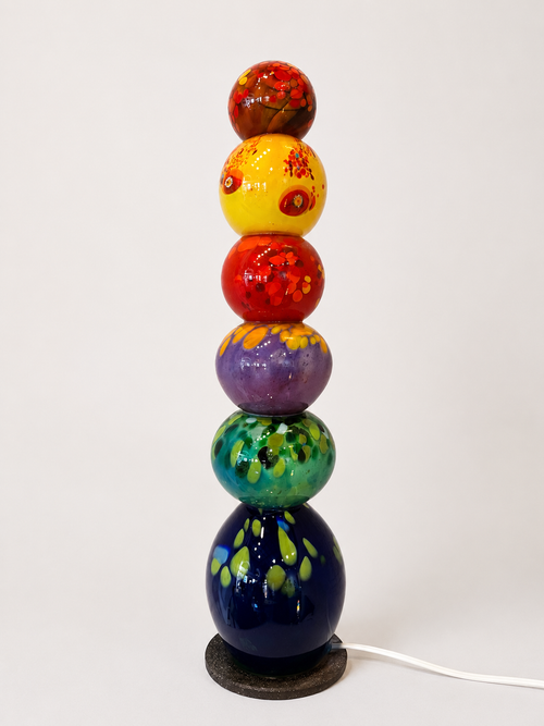 24 inch handblown glass light tower shown unlit to show glass colors
