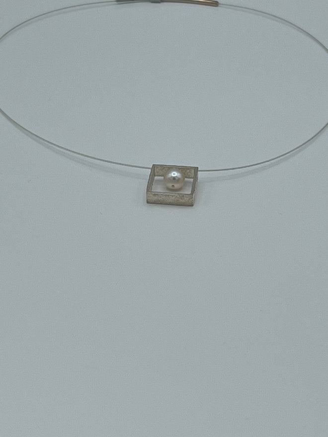 Pearl in a Square Box
