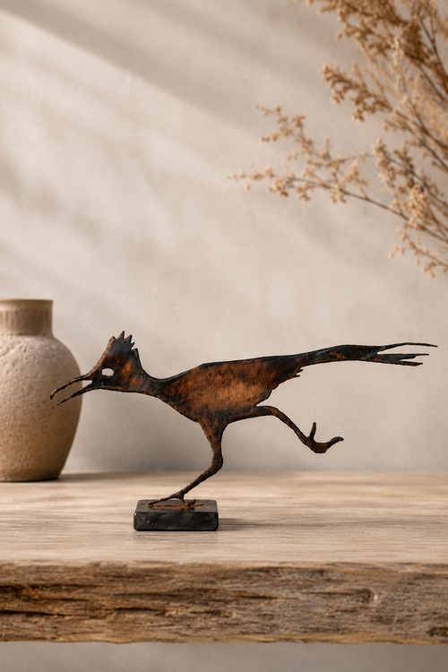Handmade steel roadrunner sculpture with rustic rusted finish for Southwest home and garden decor