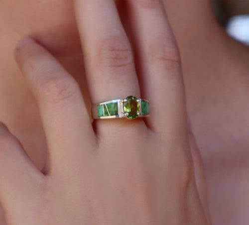 Navajo stone inlaid Sonoran gold and peridot ring on model
