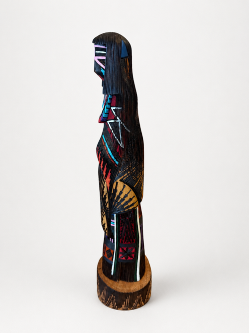 Navajo kachina dolls are handcrafted, decorative figures inspired by Puebloan traditions, typically made from wood and embellished with leather, feathers, and fur to represent spiritual beings. While they share aesthetic similarities with Hopi kachina dolls, Navajo dolls are generally produced for the art market, often utilizing, finishing, and painting techniques that differ from traditional, solely spiritual carvings. 