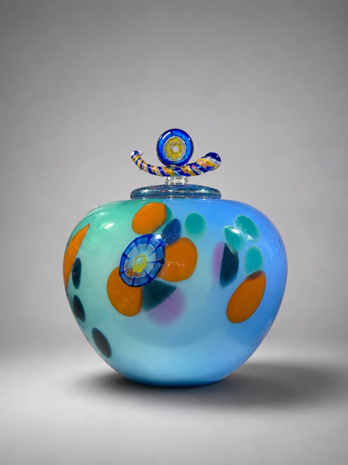 Pink and turquoise handblown glass lidded vessel by Jon Oaks