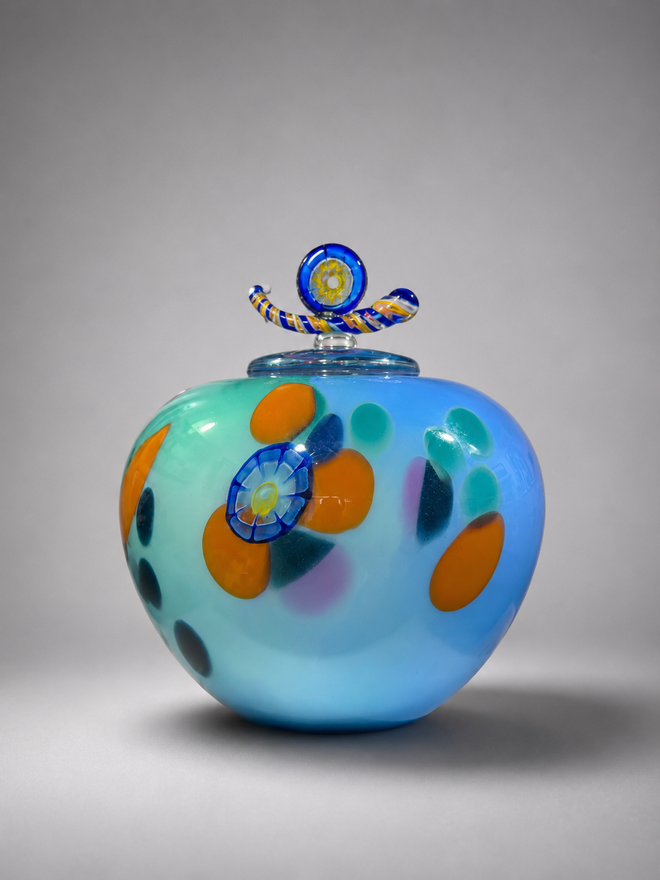 Pink and turquoise handblown glass lidded vessel by Jon Oaks