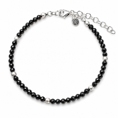 Luxury black spinel gemstone bracelet featuring faceted 3mm black spinel beads, matte sterling silver accents, and an adjustable sterling silver clasp.