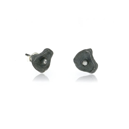 Luxury oxidized sterling silver flower stud earrings with brilliant cubic zirconia, handcrafted artisan jewelry inspired by nature and designed for everyday elegance.