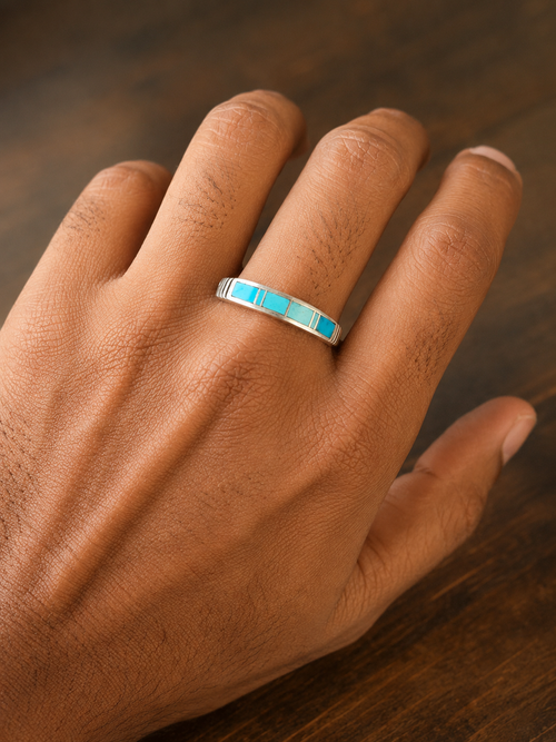 Authentic Navajo handcrafted men's sterling silver ring featuring genuine Kingman Turquoise inlay in a timeless geometric design.