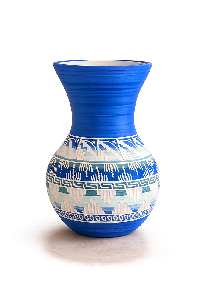 One-of-a-kind handmade Navajo pottery by Cassandra King featuring intricate carved white patterns and a vibrant cobalt blue finish. Authentic Native American ceramic vase for Southwestern home décor and art collectors.