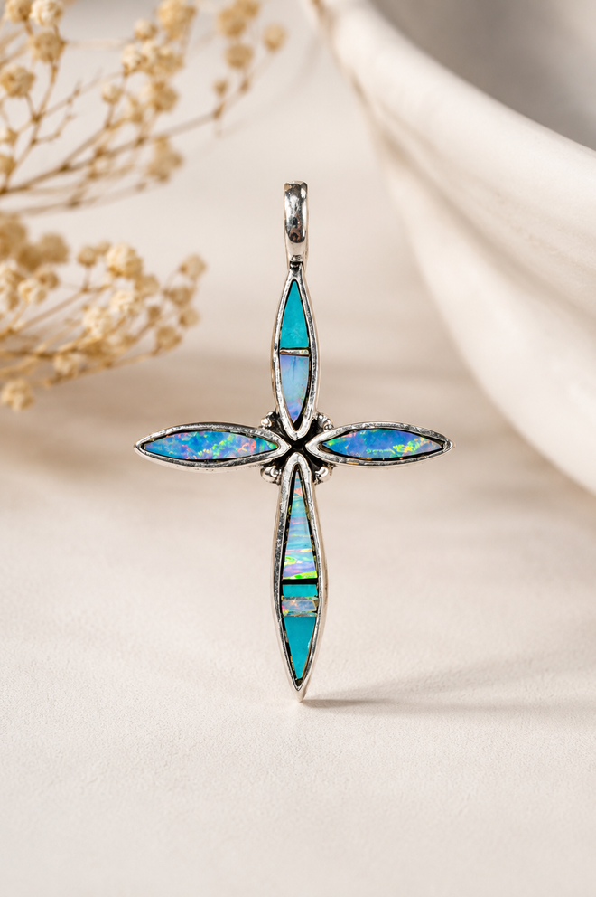 Authentic handcrafted Navajo sterling silver cross pendant featuring genuine Kingman turquoise and cultured opal stone inlay, handmade Native American jewelry.