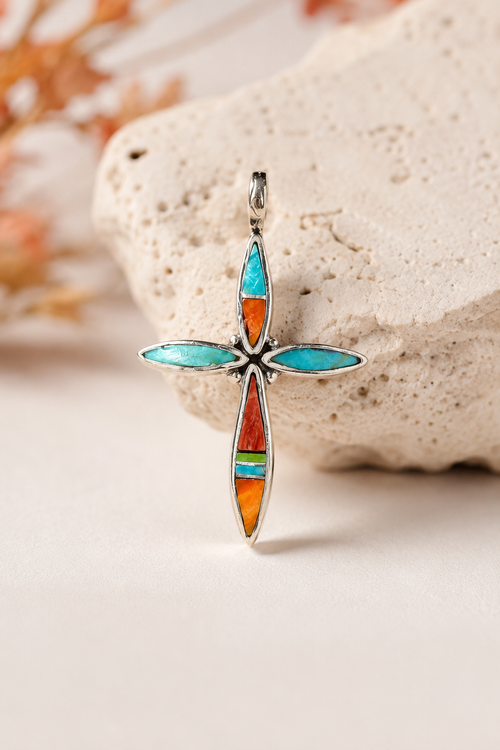 Authentic handcrafted Navajo sterling silver cross pendant featuring genuine Kingman turquoise, orange spiny oyster, red jasper, and gaspeite stone inlay, handmade Native American jewelry.