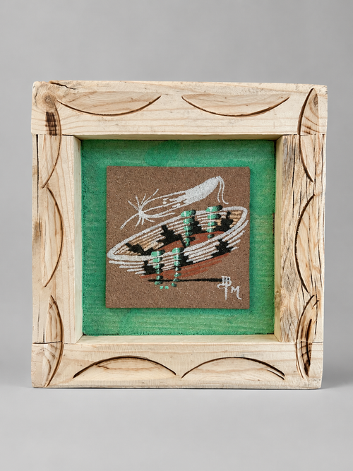 Original Navajo sand painting by Ben Mitchell featuring a basket with turquoise necklace and feather motif in a hand-carved wooden frame.