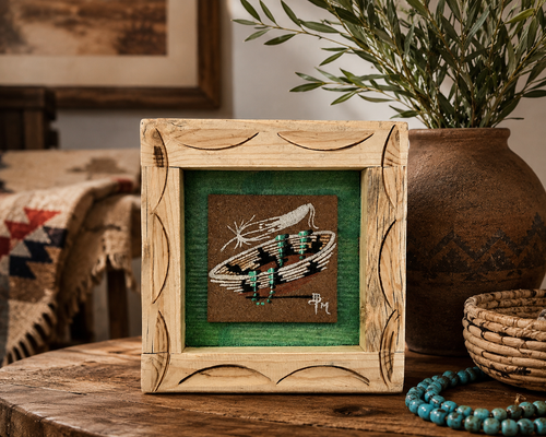 Authentic Ben Mitchell Navajo sand painting displayed in a rustic Southwestern-inspired home setting with handcrafted wooden frame