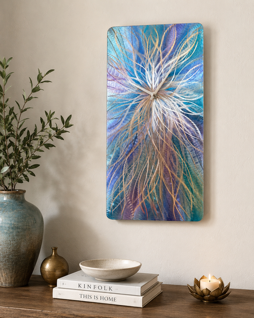 Blue feather wall clock on aluminum featuring modern abstract wall art design in blue, teal and silver tones