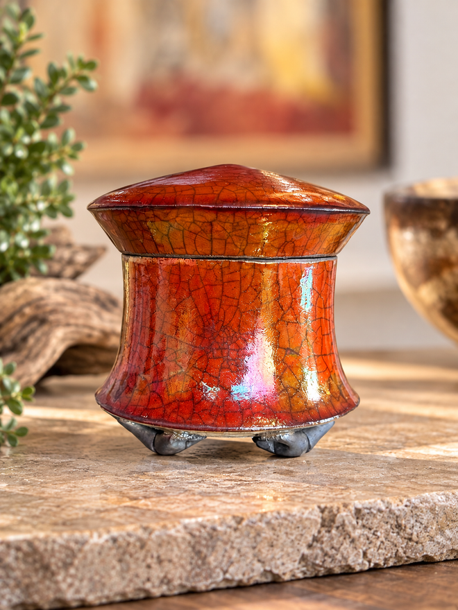 Bob Smith ferric chloride Raku lidded vessel with fiery red-orange crackle surface, handcrafted using a rare firing technique