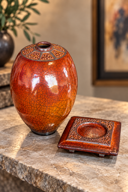 Bob Smith ferric chloride Raku vase shown with its separate ceramic altar and distinctive crackled surface
