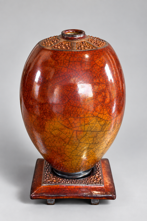 Bob Smith ferric chloride Raku vase on altar, created with a rare specialized Raku firing technique