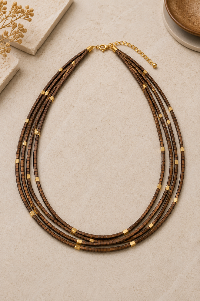 Four-strand brown hematite necklace with 2mm square-cut beads and gold-plated sterling silver accent beads, adjustable 18 to 20 inch handmade statement necklace.
