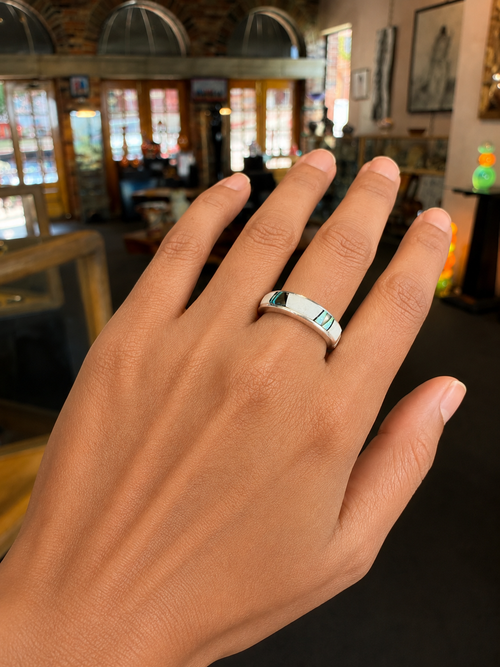 Buffalo Turquoise and Opal sterling silver inlay ring shown on hand
