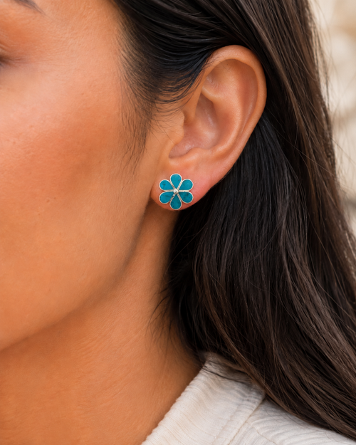 Chrysocolla flower stud earrings worn on ear showing 0.7 inch blue green floral design