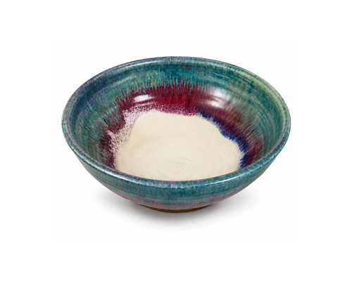 Handmade Arizona ceramic Desert Bowl in Coastal Breeze glaze featuring flowing blue, green, cream and soft violet tones. Artisan pottery serving bowl, wheel-thrown and one of a kind, available from Raku Gallery in Jerome, Arizona.