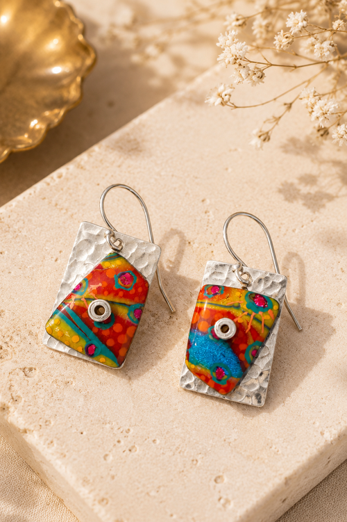 Colorful everyday earrings in sterling silver featuring vibrant orange, blue, pink, and green accents.
