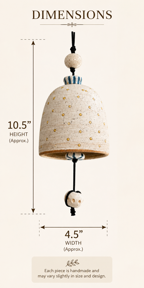 Cream ceramic bell dimensions 10.5 inches tall and 4.5 inches wide