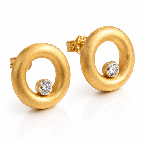 Luxury handmade matte gold vermeil statement stud earrings with 4 mm white cubic zirconia, modern open circle design in sterling silver for everyday elegance.