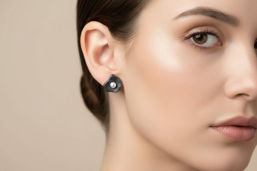 Designer handcrafted oxidized sterling silver petal earrings with genuine freshwater pearls, boutique artisan jewelry inspired by nature.