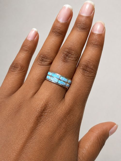 ouble row white cultured opal inlay ring in sterling silver shown on hand