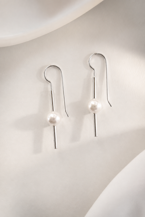 Freshwater pearl drop earrings in sterling silver with modern minimalist design