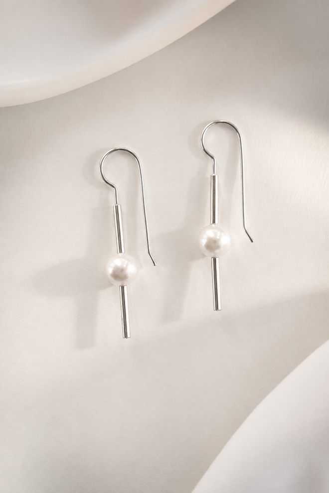 Freshwater pearl drop earrings in sterling silver with modern minimalist design