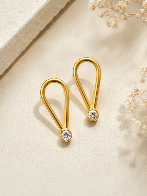 Gold vermeil open loop earrings with contemporary minimalist design