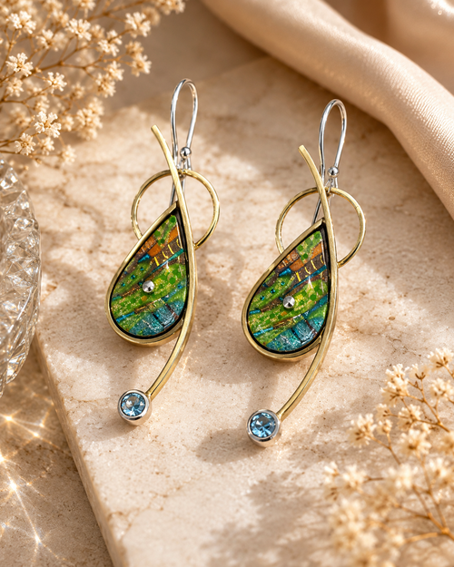 Green and blue designer earrings with blue topaz accents, sterling silver and brass details.
