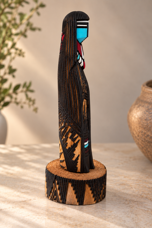 Hand-carved Navajo Long Hair Kachina cottonwood sculpture with intricate burned-line patterns by Jerold Guy