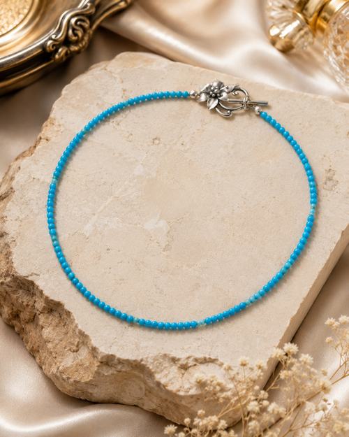 hand beaded kingman turquoise necklace with silver flower clasp 