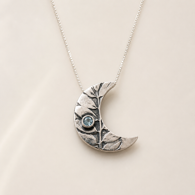 One-of-a-kind handmade crescent moon necklace with aquamarine in sterling silver handcrafted in Sedona Arizona artisan jewelry
