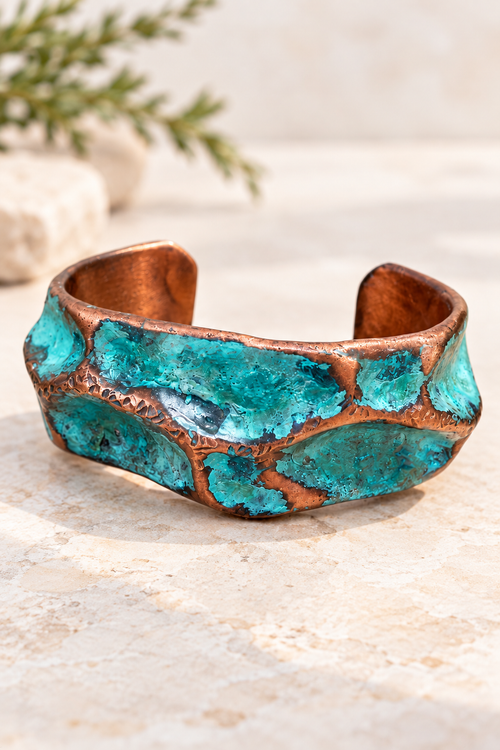 Handmade copper patina cuff bracelet by Sedona artist Chikako Myers with sculptural blue-green textured finish.