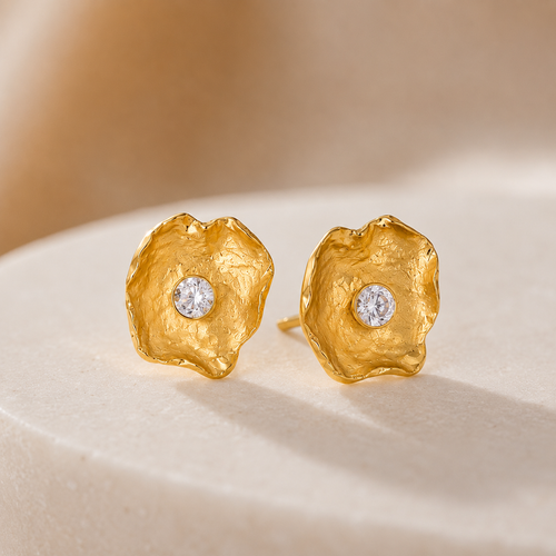 Handcrafted gold vermeil petal stud earrings with brilliant 4 mm cubic zirconia, modern artisan sterling silver jewelry inspired by nature for everyday elegance and special occasions.