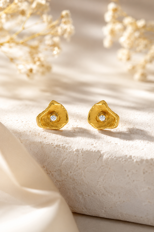 Handmade gold vermeil petal stud earrings with sparkling cubic zirconia, elegant sterling silver designer earrings for everyday luxury and timeless style.