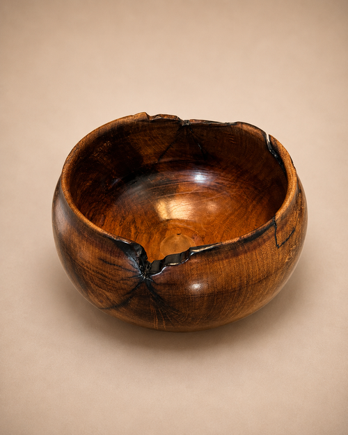 Large handmade mesquite burl bowl with dramatic grain and organic form