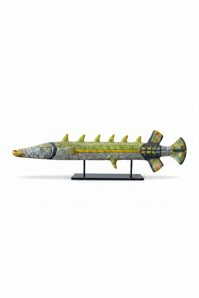 Handmade raku ceramic trumpet fish sculpture on metal stand with crackle glaze, handcrafted Arizona art for coastal and contemporary home decor.