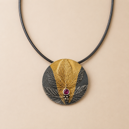 One-of-a-kind handmade ruby necklace in oxidized sterling silver with 24k gold accents handcrafted in Sedona Arizona