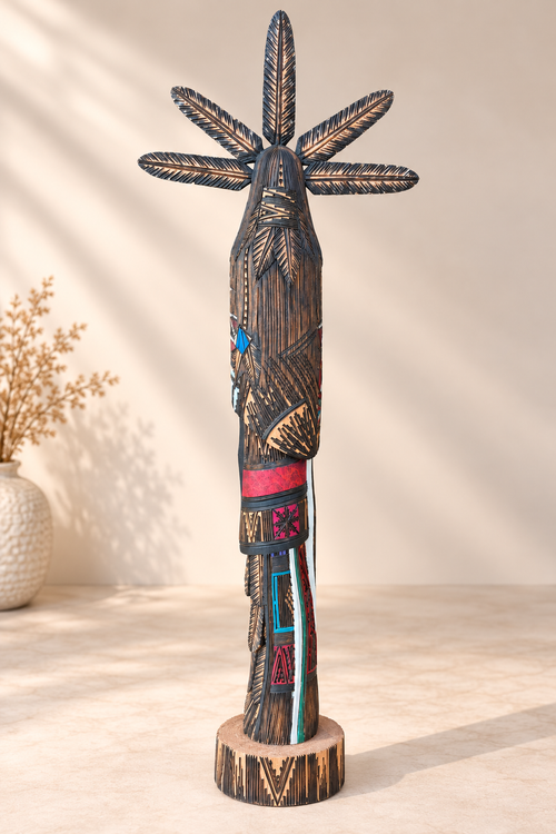 Back view of Jerold Guy Navajo Kachina showing extensive burned-line carving, natural cottonwood and five carved feathers