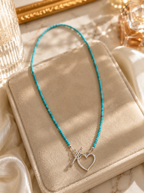 16-inch Kingman turquoise 2mm bead necklace with sterling silver heart toggle clasp, handcrafted in Sedona Arizona.