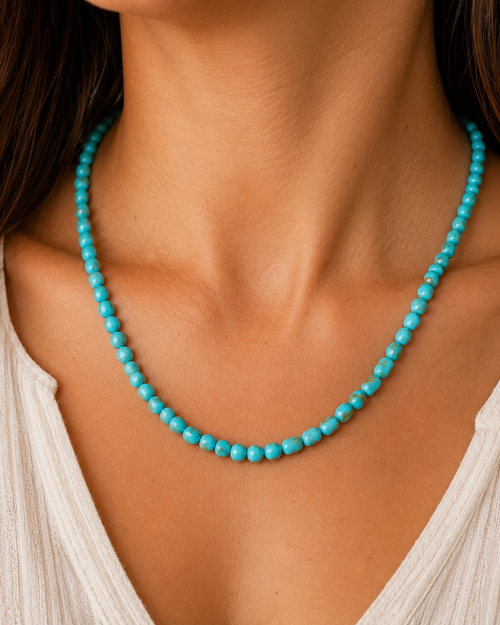 Kingman turquoise bead necklace worn on the neck showing the fit of the 17 inch length